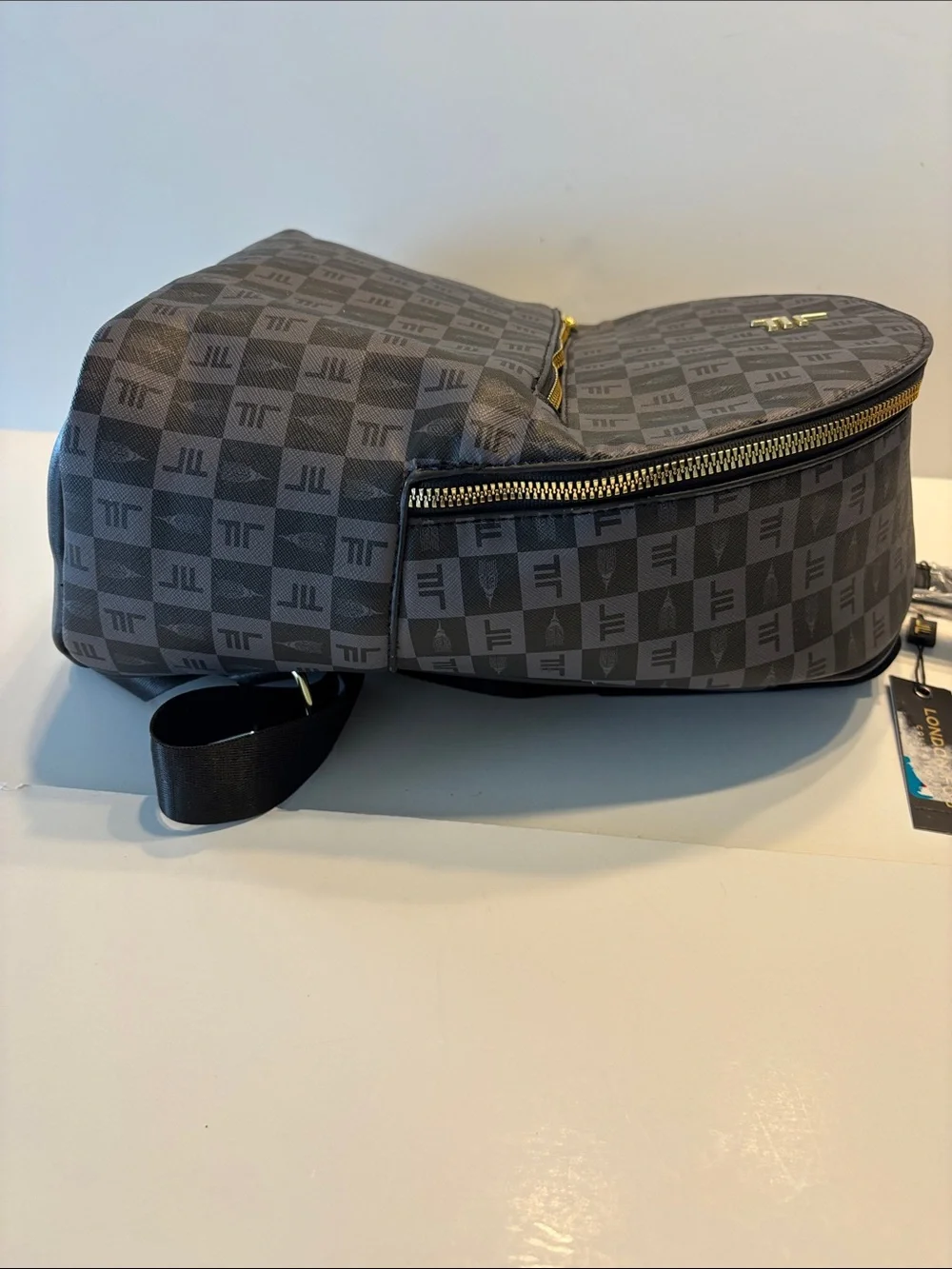 London Fog Women's Raven Tower Signature Print Backpack in Black